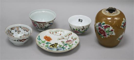 An 18th century Chinese famille rose tiger saucer dish, a Batavia ware jar and three porcelain tea bowls